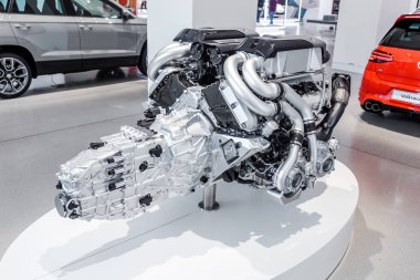 17 MAY 2018, BERLIN, GERMANY: Car Engine or motor standing in museum exhibition hall clipart