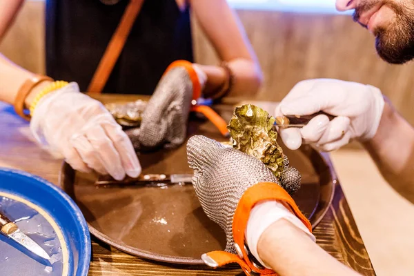 Woman Opens Oyster Knife Restaurant — Stock Photo, Image