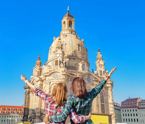 Two Happy Women Hugging Looking Main Attraction Dresden Frauenkirche Concept — Stock Photo, Image
