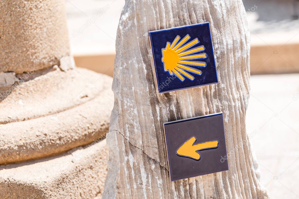 Camino de Santiago Compostela sign shells and trail marks, one of the most popular routes for pilgrim in the World