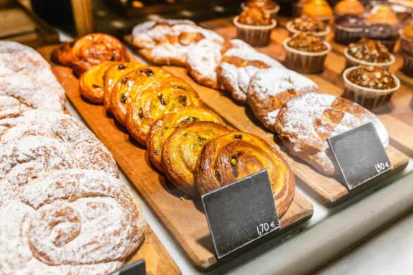 Bakery pastries display into a cake shop