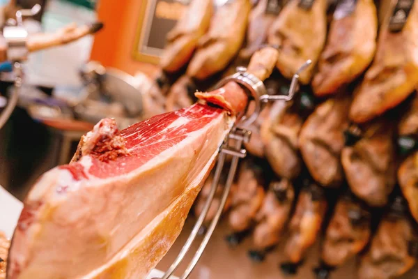 leg of Spanish Iberian jamon ham for sale in traditional shop