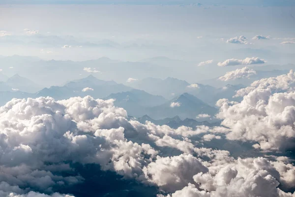 Mountains and clouds view from the airplane