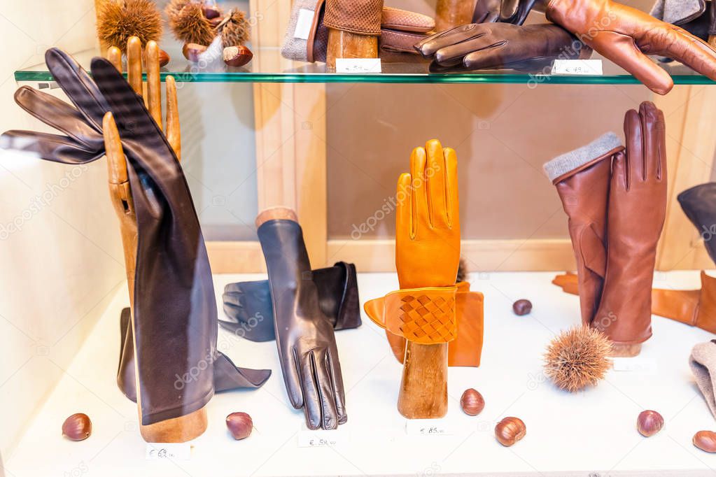 Fashion leather gloves on display for sale at the boutique