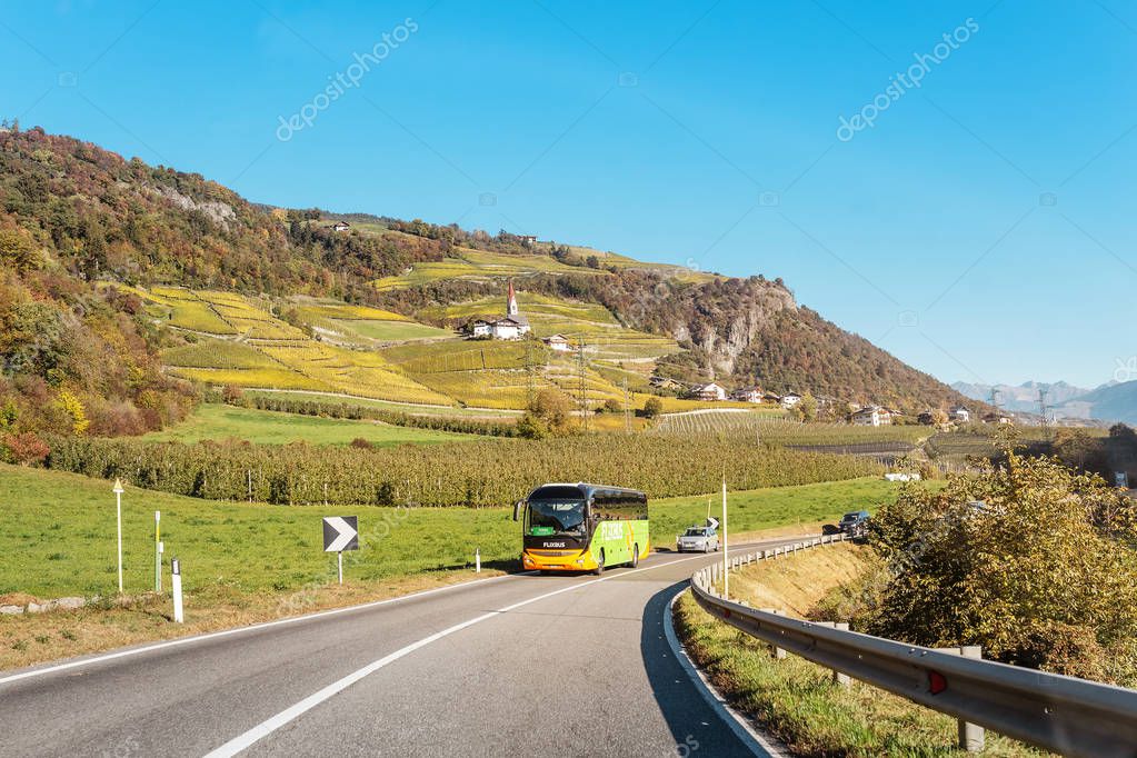 21 OCTOBER 2018, BOLZANO REGION, ITALY: Flixbus intercity bus on a mountain road