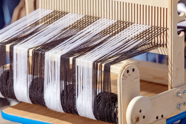 weaving loom machine closeup