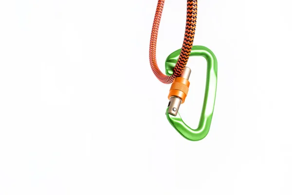 stock image Incorrectly applied carabiner hanging on a rope. Concept of an accident and total mistake