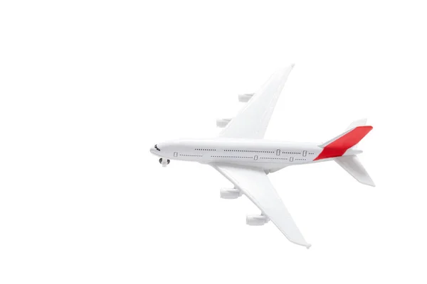 İzole oyuncak model uçak. Seyahat ve hava taşıma konsantrasyon — Stok fotoğraf