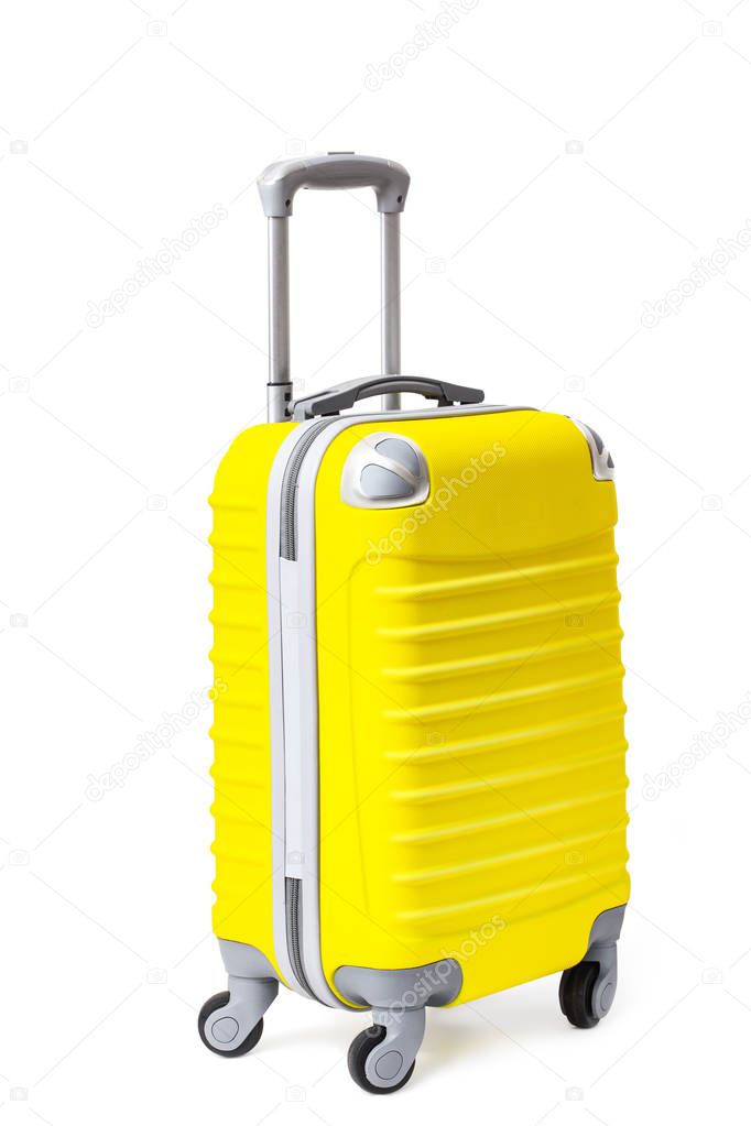 Modern yellow suitcase isolated on white. Travel baggage and tou