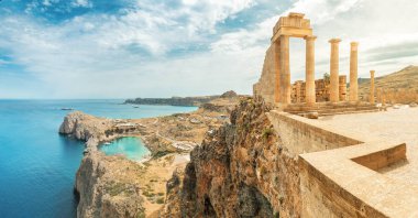 Famous tourist attraction - Acropolis of Lindos. Ancient architecture of Greece. Travel destinations of Rhodes island clipart