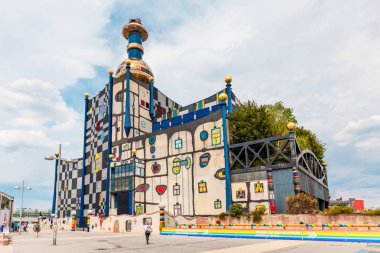 19 July 2019, Vienna, Austria: Famous Hundertwasser architecture building Spittelau trash incineration factory clipart