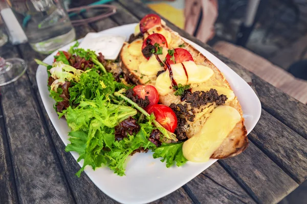 Healthy french breakfast with herbs and toast with cheese and sauce — Stock Photo, Image