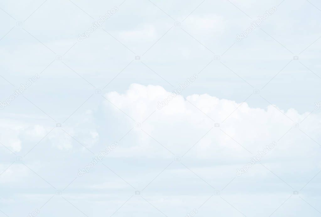 Blurred abstract natural background with clouds in light blue tonality with copy space