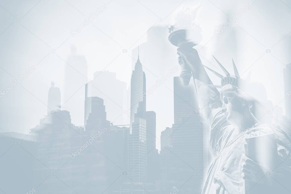 Light blue image of Abstract New York City symbols. Skyscrapers of Lower Manhattan and the Statue of Liberty. Multiexposition, blurs