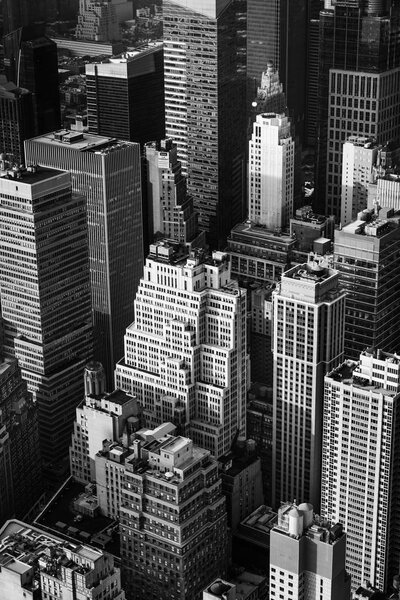 NEW YORK, USA - Sep 17, 2017: Black and white image of the streets and roofs of Manhattan. New York City Manhattan midtown viewed from top of Empire State Building. Birds eye view