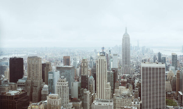 NEW YORK, USA - May 03, 2016: New York skyline in vintage film color. Aerial view over Manhattan with Empire State Building. Manhattan is the most densely populated of the five boroughs of NYC