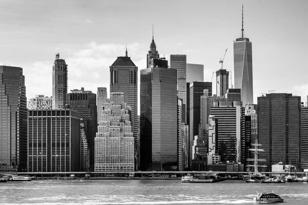 NEW YORK, USA - Apr 27, 2016: Black and white image of Manhattan financial district with skyscrapers over East River