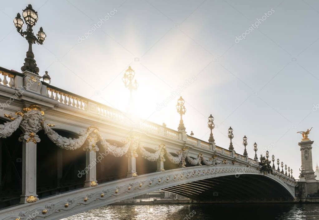 Beautiful bridge of Alexandre III in Paris. Decorated with ornate Art Nouveau lamps and sculptures