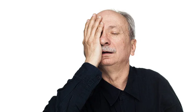 Elderly man suffers from headache — Stock Photo, Image