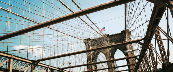 NEW YORK, USA - Apr 27, 2016: Brooklyn Bridge is a hybrid cable-stayed suspension bridge in New York City and is one of the oldest bridges of either type in the United States