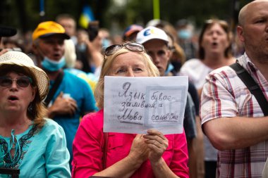 KYIV, UKRAINE - Jul 16, 2020: Mass protests near the Verkhovna Rada of Ukraine in support of the Ukrainian language.  clipart