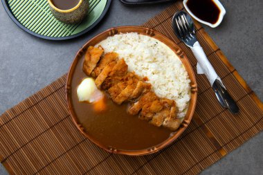 Katsu curry; Curry rice with fried por clipart