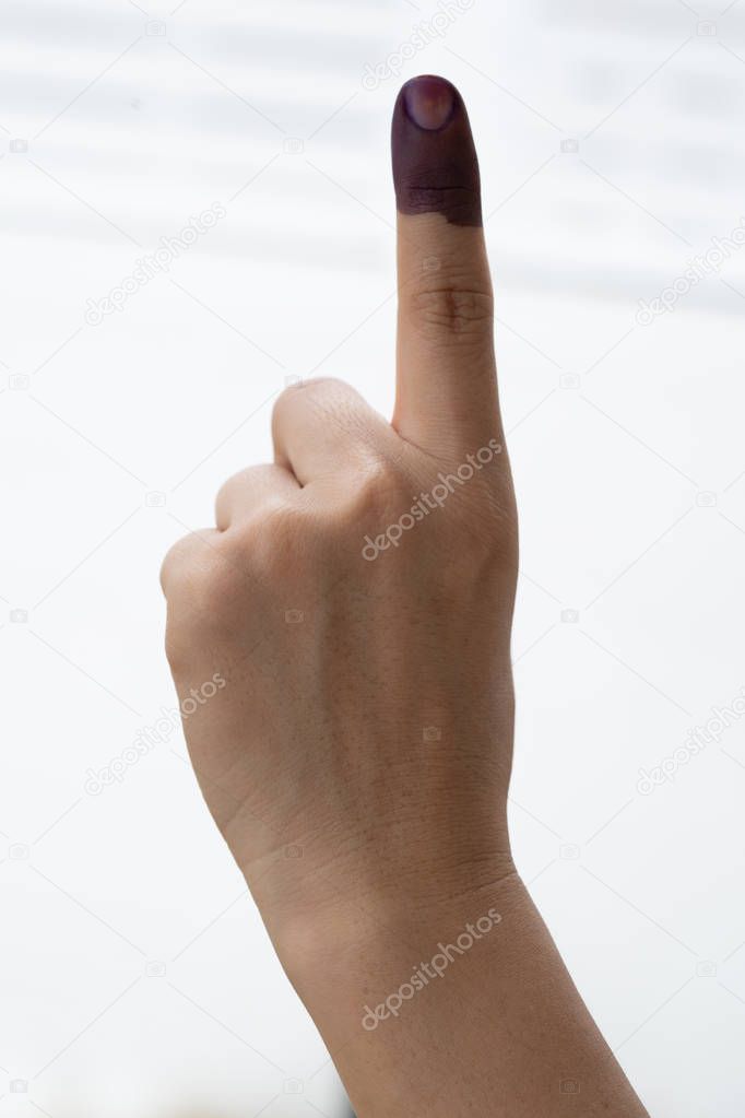 A finger mark with indelible ink at a polling station in Malaysia