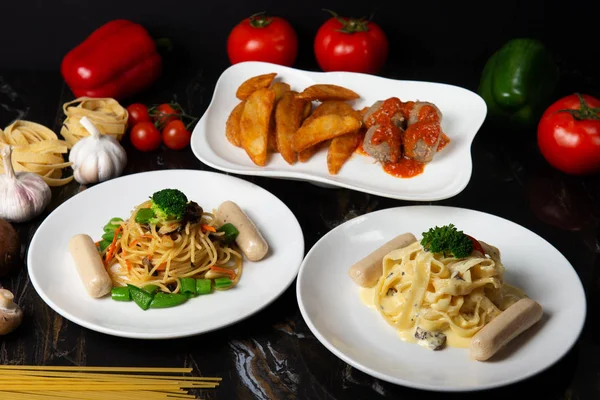 close-up shot of various pastas with potato wedges