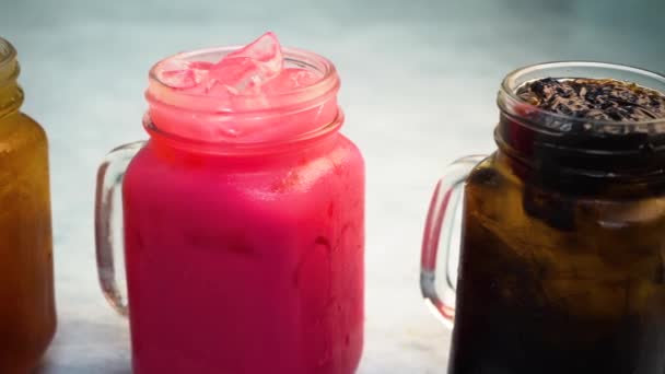 Close Footage Iced Tea Mason Jars Grey Background — Stock Video