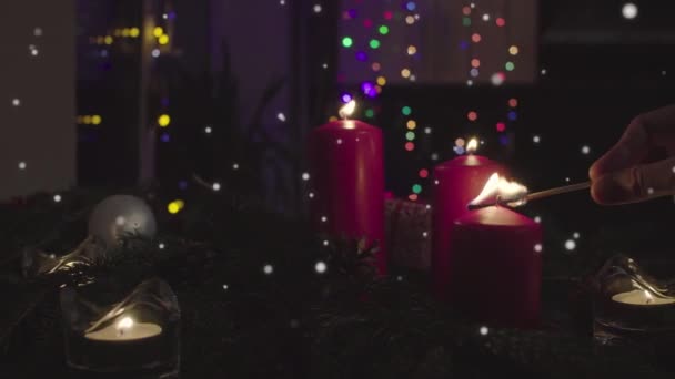 Анимация Feliz navidad - Счастливого Рождества на испанском языке, белые буквы и красные свечи — стоковое видео