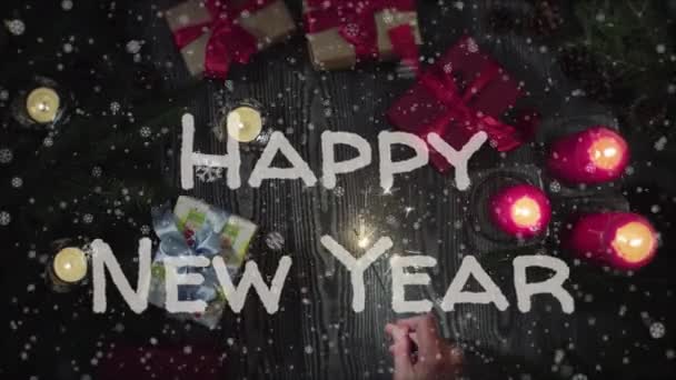 Animation Happy New Year, female hand holding a sparkler — Stock Video