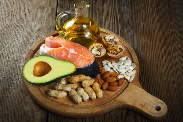 Healthy fat source: salmon, oil, avocado, pumpkin seeds, walnuts, peanuts and almonds