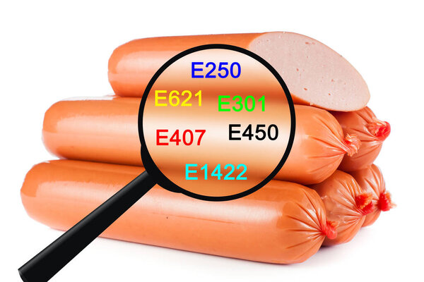 Unhealthy food concept - chemical additives in food. Sausages on white background