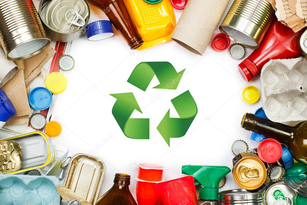 A selection of garbage for recycling. Segregated metal, plastic, paper and glass