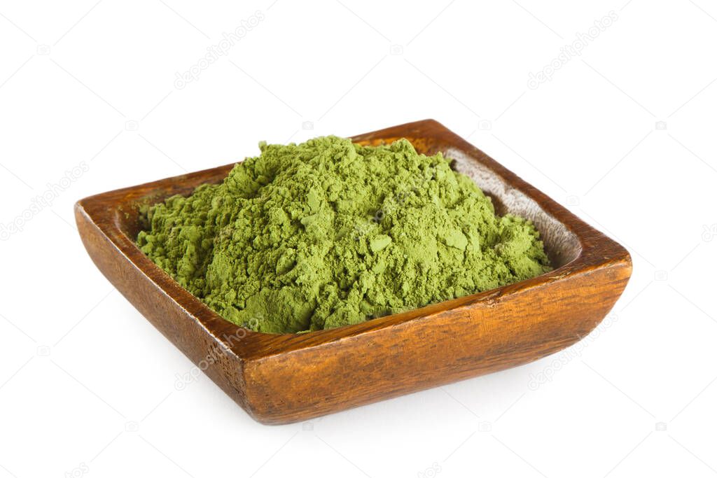 Matcha, powdered green tea isolated on white background. Superfood