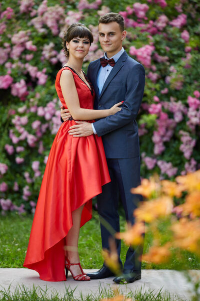 Beautiful young couple outdoor dressed as for prom or celebration