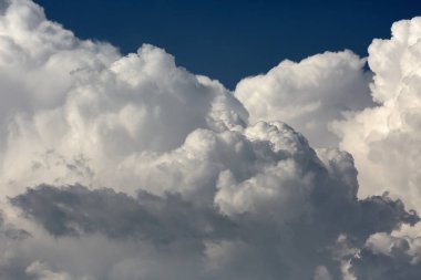 Cloudscape with big cumulonimbus clouds in summer clipart