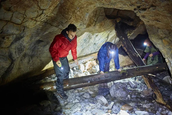 Family Hikers Exploring Cave Limestone Mountain — Stock Photo, Image