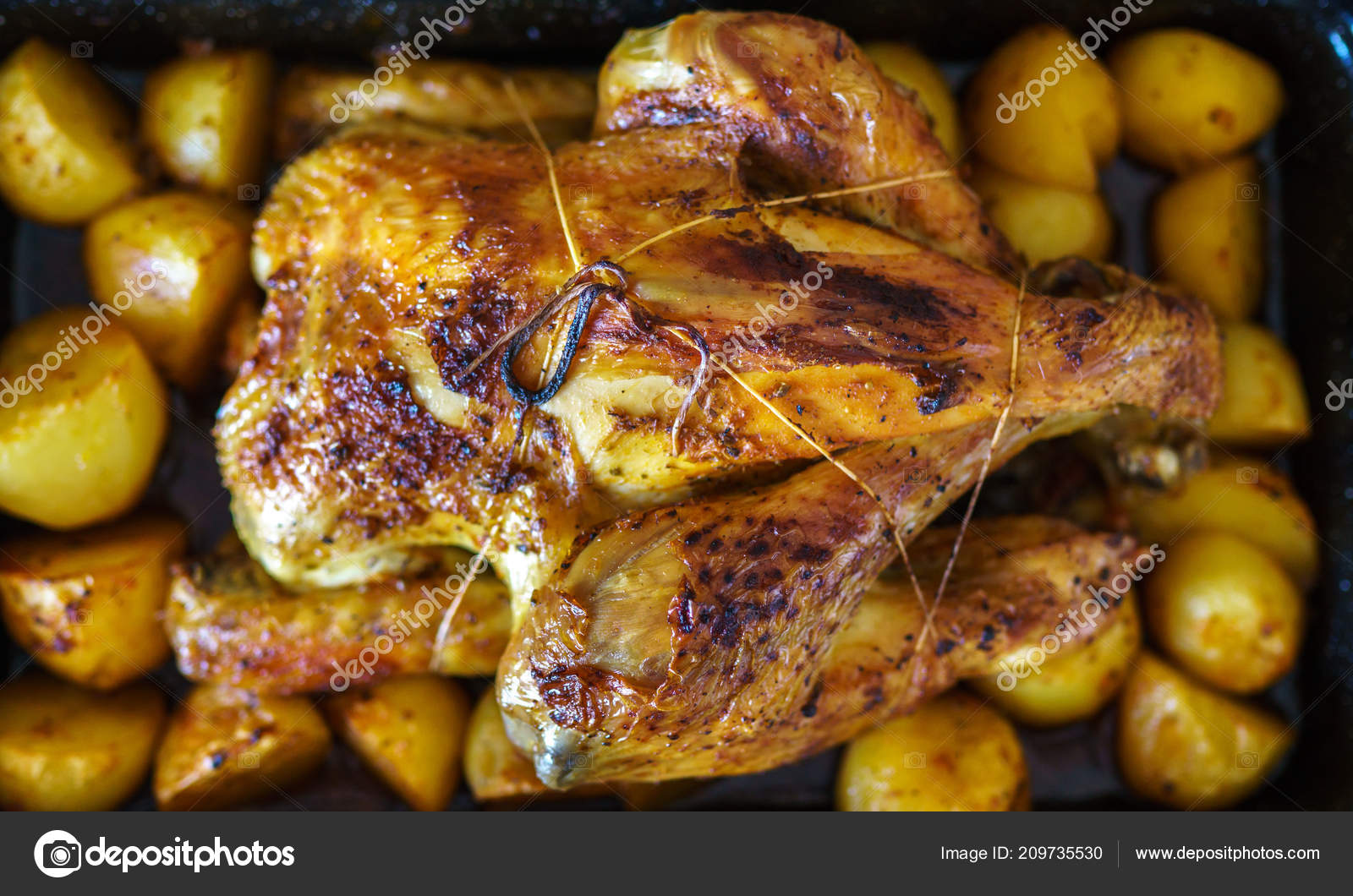 Whole Chicken Slow Cooked Oven Potatoes Tray Stock Photo by ©Xalanx