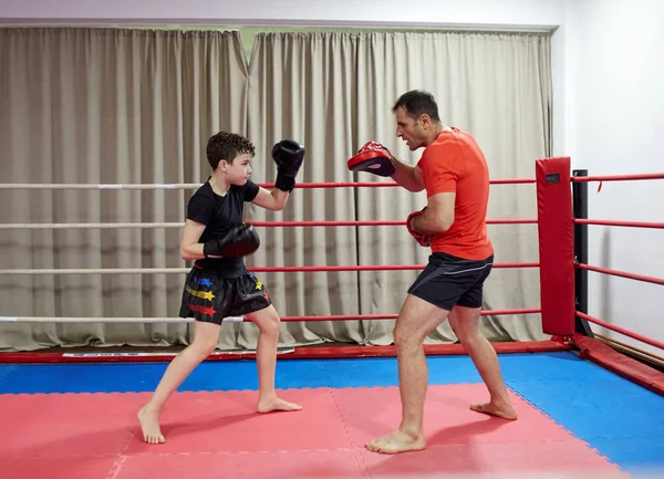 Young Kickboxing Fighter Hitting Mitts His Coach — Stock Photo, Image