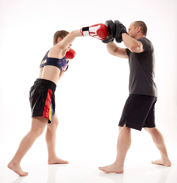 Girl Kickboxing Fighter Hitting Mitts Her Coach Isolated White Background — Stock Photo, Image