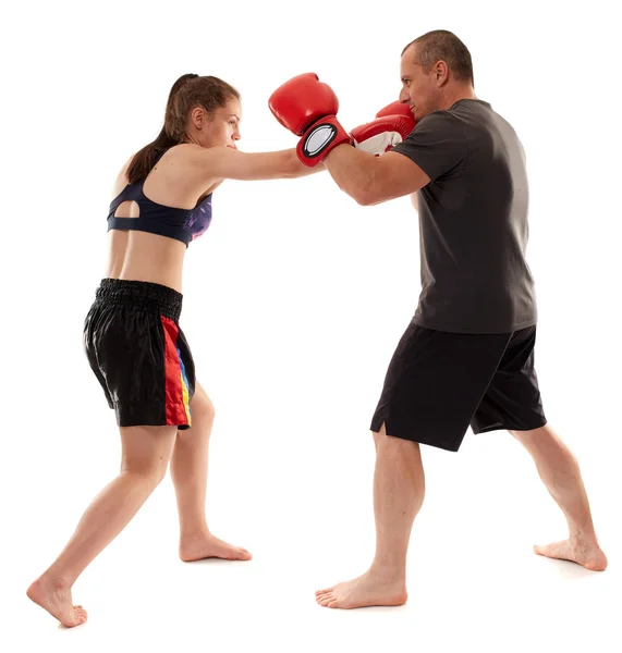 Joven Mujer Kickboxer Sparring Con Entrenador Sobre Fondo Blanco —  Fotos de Stock