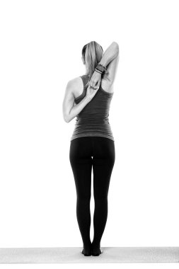 Çeşitli pozlar Kadın yoga öğretmeni, beyaz arka plan üzerinde izole