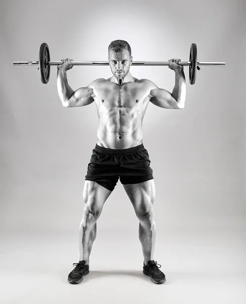 Man Doing Shoulder Workout Barbell Gray Background — Stock Photo, Image