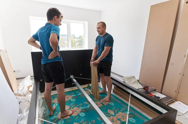 Father Helping His Son Assembly Build Furniture His New Home — Stock Photo, Image