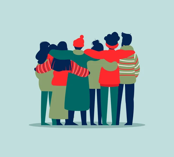 Diverse friend group of people hugging together in winter clothes for christmas or seasonal celebration. Girls and boys team hug on isolated background with copy space.