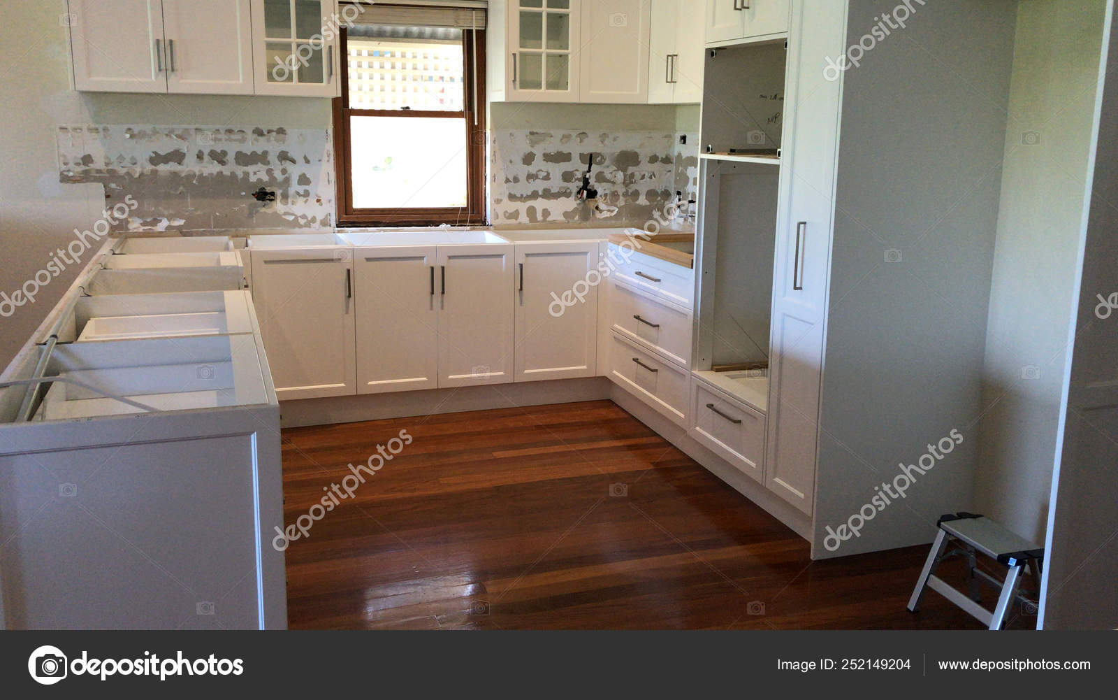 Extensive Kitchen Renovation New Stone Bench Tops White Cupboards