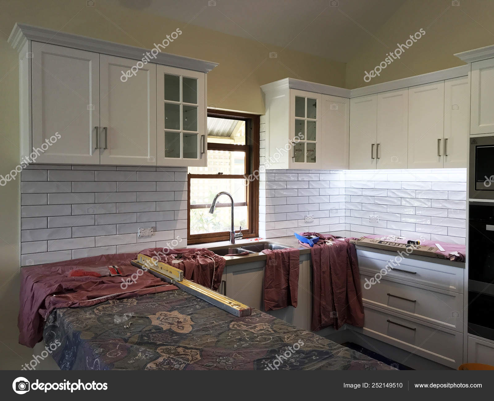 Extensive Kitchen Renovation New Stone Bench Tops White Cupboards