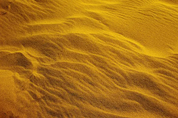 Areia de grãos e duna ondulada — Fotografia de Stock