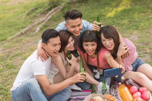 people selfie with his friends in the park